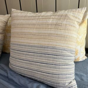 Pair Studio McGee Toss Pillows light blue and yellow ombré.